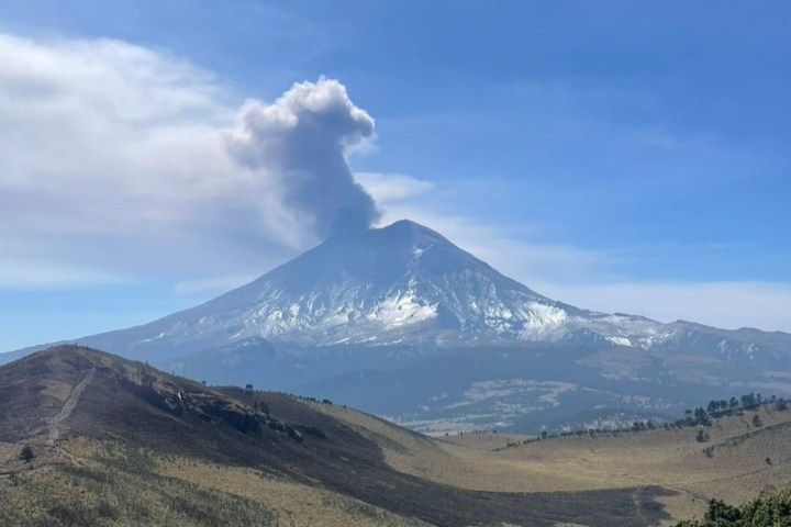 a large mountain in the background