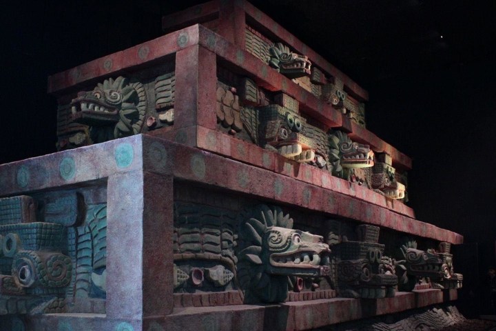 a large brick building with many windows and a fireplace