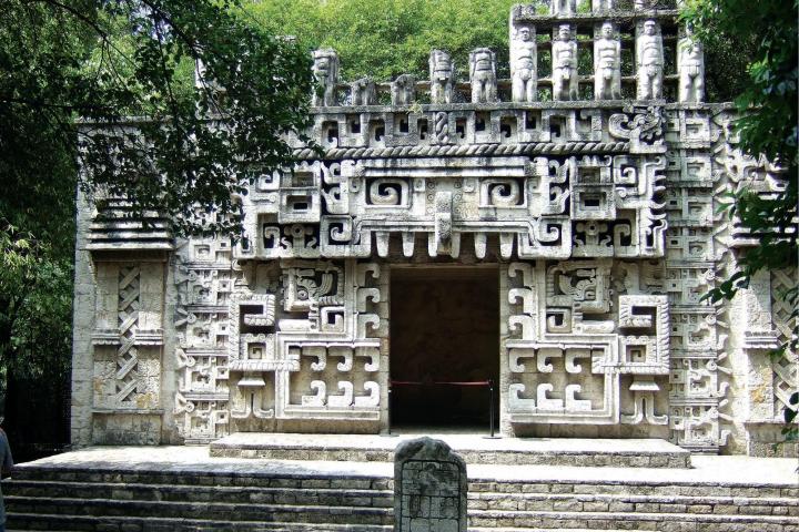 a statue in front of a building