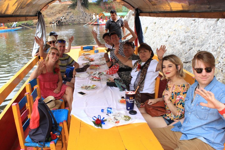 a group of people sitting at a table