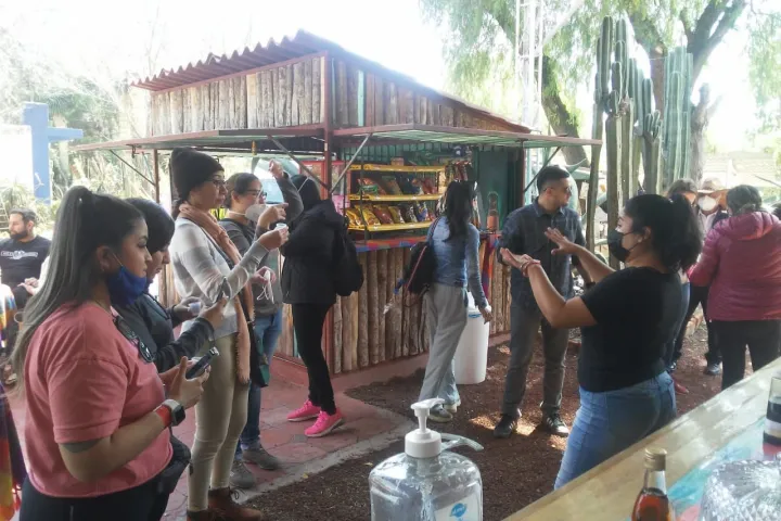 a group of people standing in front of a crowd