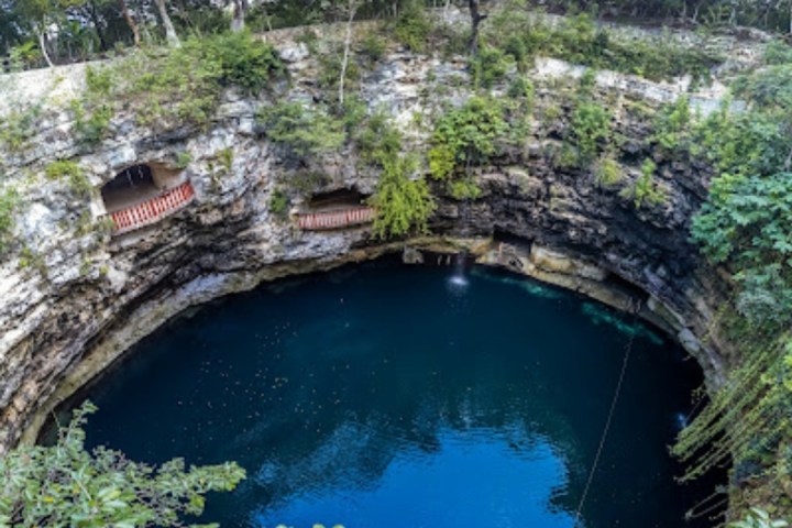 a tunnel with water in the background