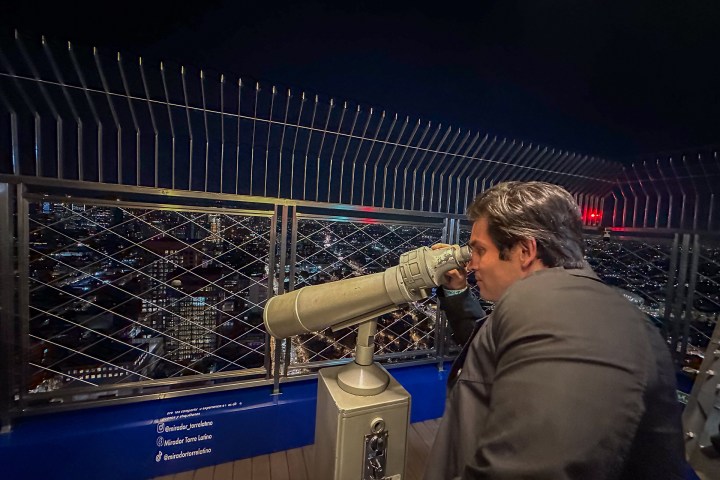 a man in a blue shirt