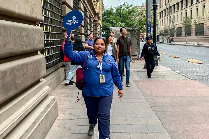 a man and a woman walking down a city street