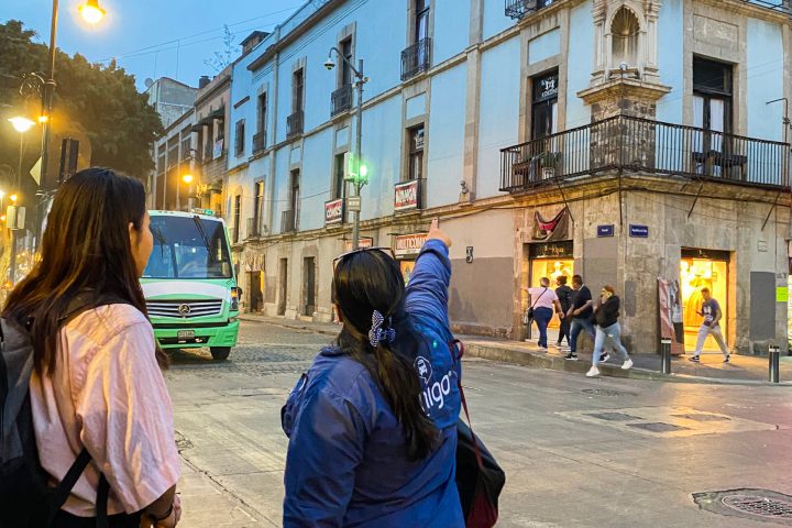 a person standing in front of a building