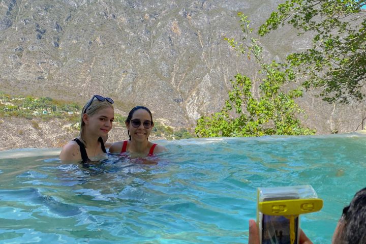 a group of people swimming in the water