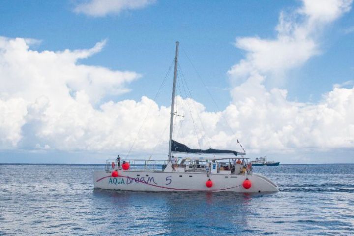 a small boat in a large body of water