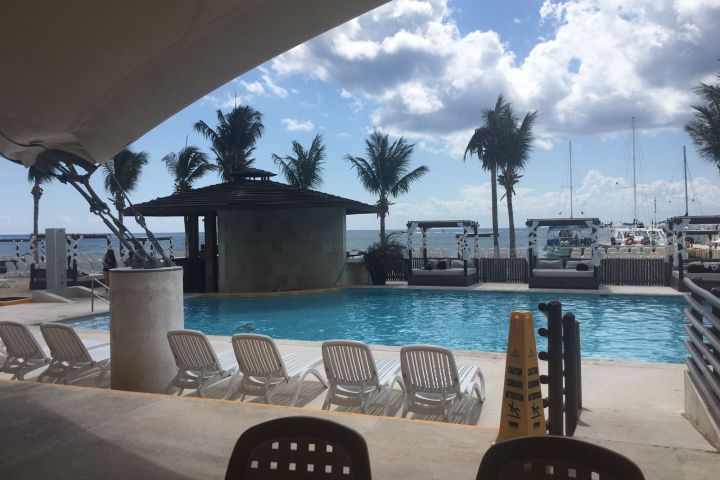 a chair sitting in front of a pool