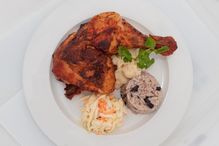 a plate of food with meat and vegetables
