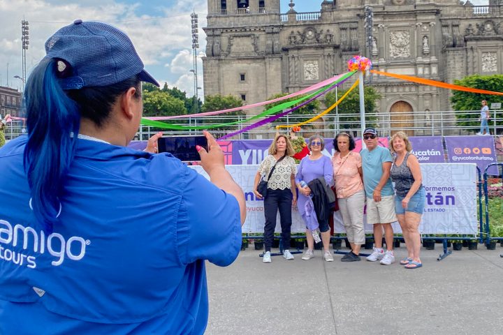 a group of people standing in front of a building