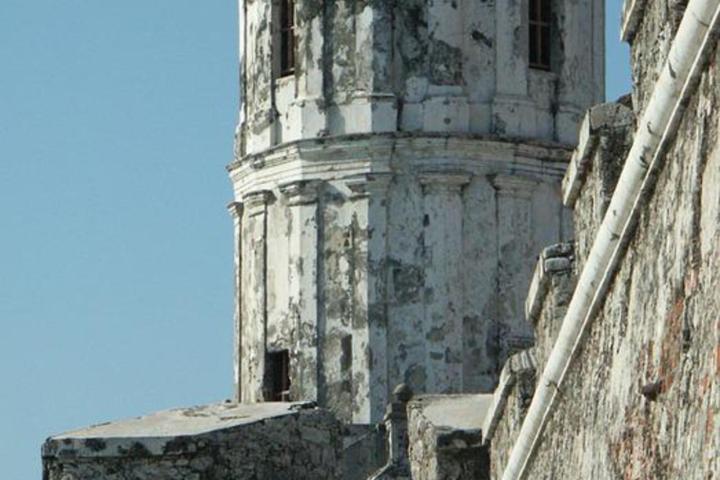 a large stone building with a clock tower