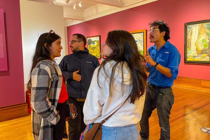 a couple of people that are standing in a room