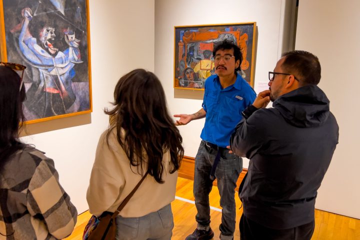 a group of people standing in a room