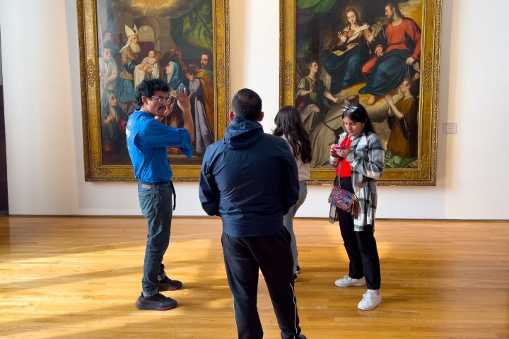 a group of people standing in a room