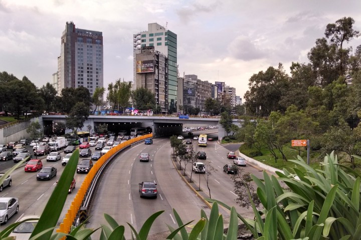 a city street filled with lots of traffic