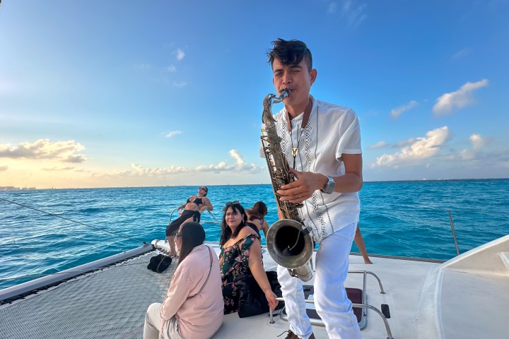 a person standing in front of a body of water