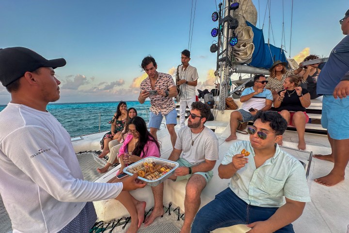 a group of people that are eating some food