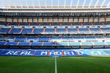 a large stadium with Santiago Bernabéu Stadium in the background