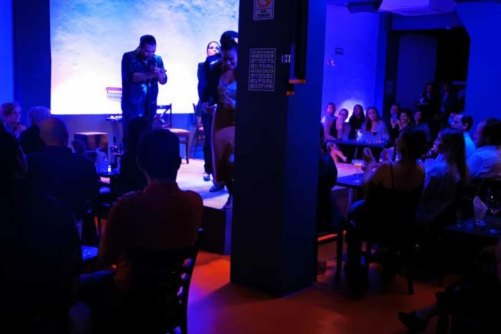 a group of people in a dark room