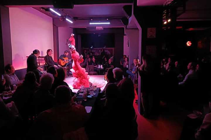 a group of people in a dark room