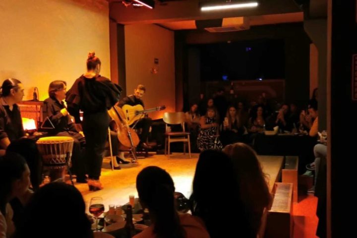 a group of people in a dark room