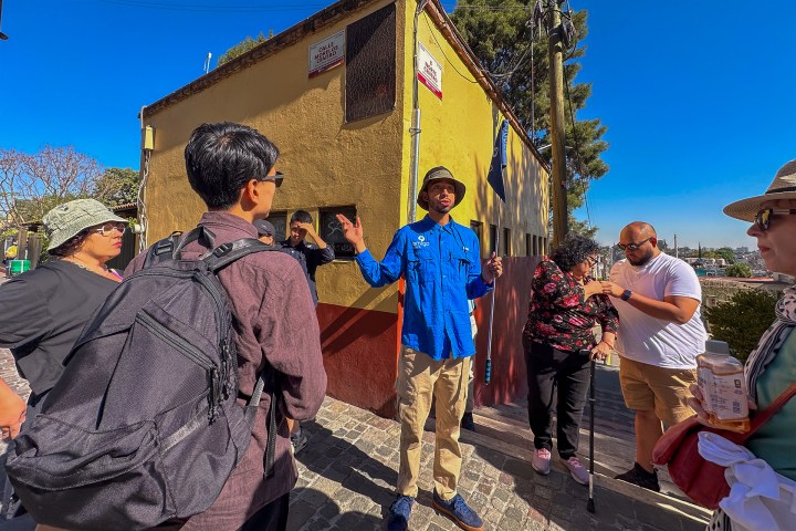 a group of people standing in front of a crowd