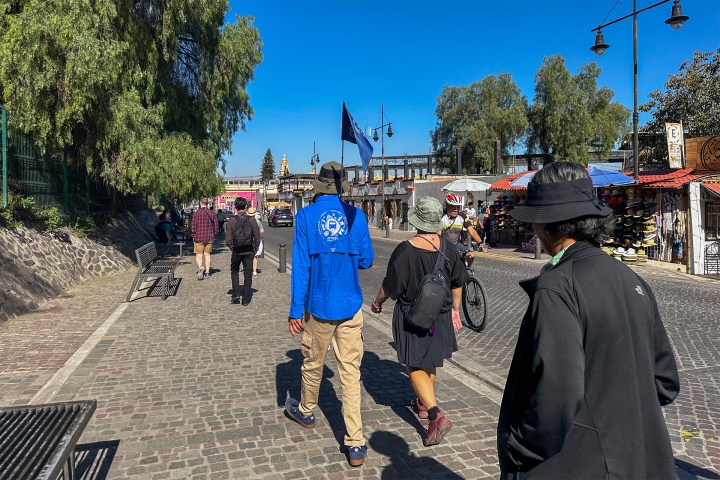 a group of people standing in front of a crowd