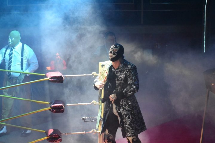 a group of people standing around a fire