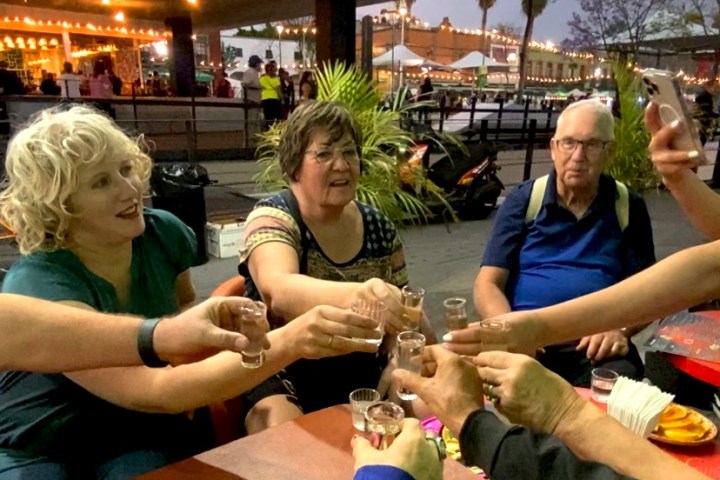 a group of people sitting at a table