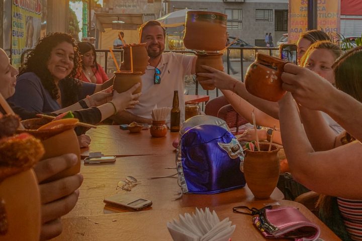 a group of people sitting at a table