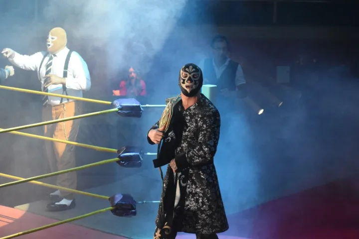 a man and a woman standing on a stage