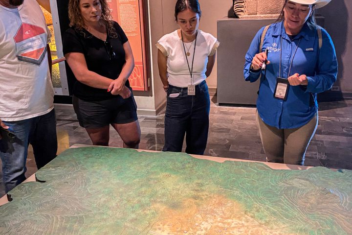 a group of people standing in a room