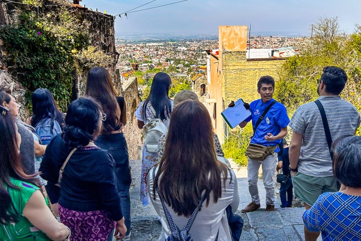 a group of people standing in front of a crowd