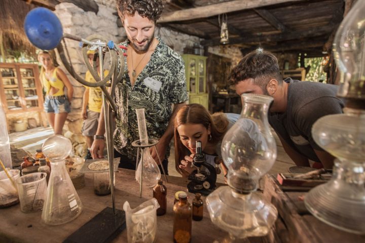 a man and a woman sitting on a table