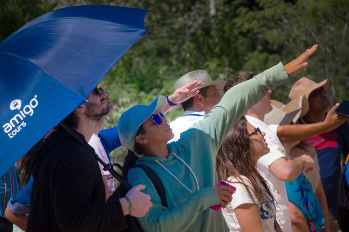 a group of people standing in front of a crowd