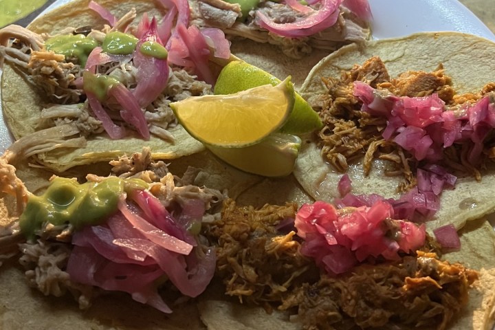 a plate of food with meat and vegetables