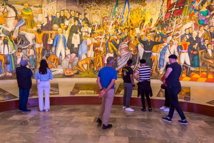 a group of people standing in front of a crowd