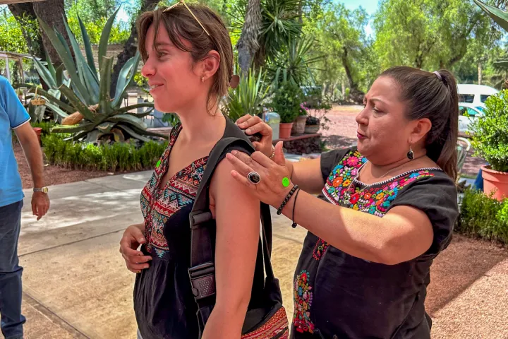 a person holding a child