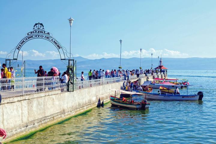 a group of people on a boat in the water