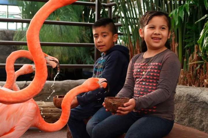 a couple of people that are sitting on a bench