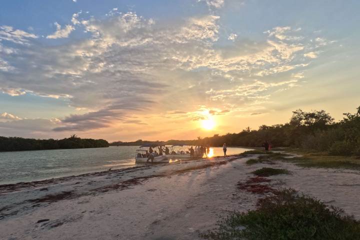 a sunset over a body of water