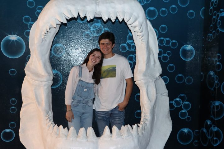 a statue of a man and woman posing for a picture