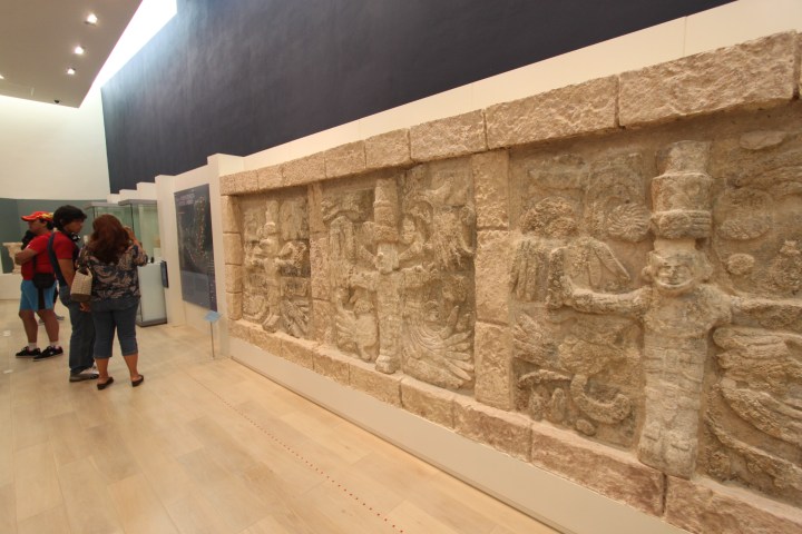 a group of people standing in front of a building