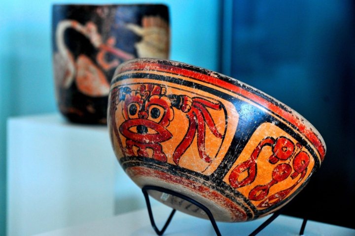 a close up of a vase on a table