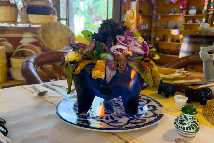 a vase of flowers on a table