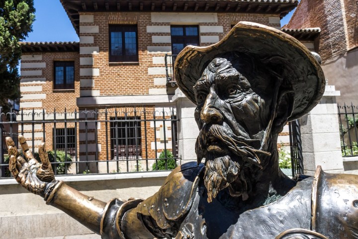a statue in front of a building