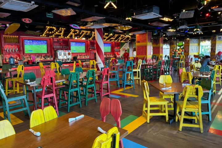 a person sitting on display in a store