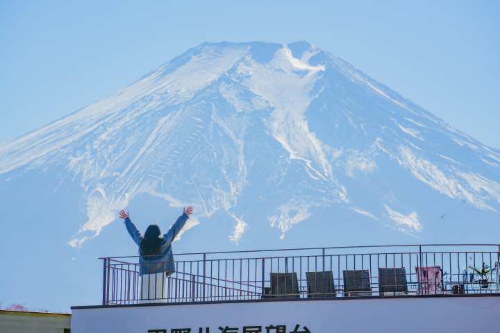 a man riding on top of a mountain