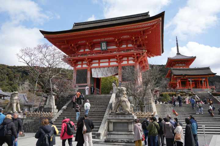 a group of people standing in front of Kiyomizu-dera