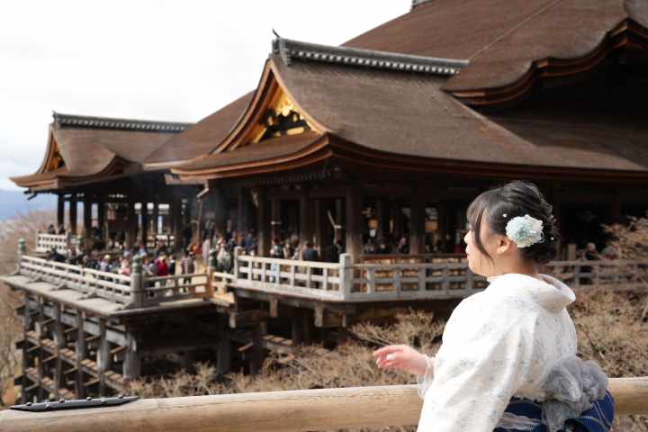a person standing in front of Kiyomizu-dera